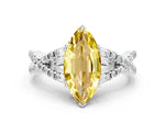 Marquise Cut Yellow Sapphire Solitaire Ring in White gold with Interwoven Pavé Band and Prong Setting