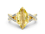 Marquise Cut Yellow Sapphire Solitaire Ring in Yellow gold with Interwoven Pavé Band and Prong Setting