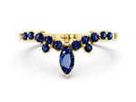 Marquise and Round Blue Sapphire Chevron Band in Yellow gold with Prong Setting