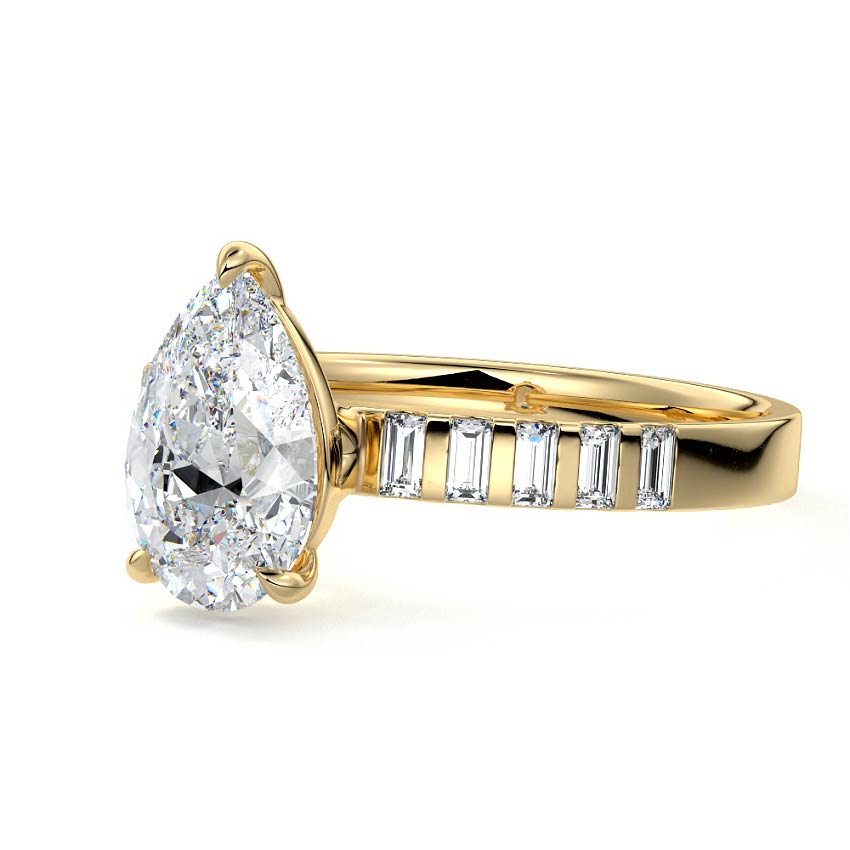 Yellow gold Pear Diamond Side Stone Ring with Vertical Baguette Accents in Prong Setting