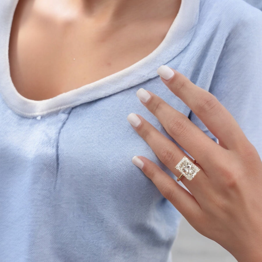 Yellow gold Radiant Diamond Hidden Halo Solitaire Engagement Ring with Prong Setting