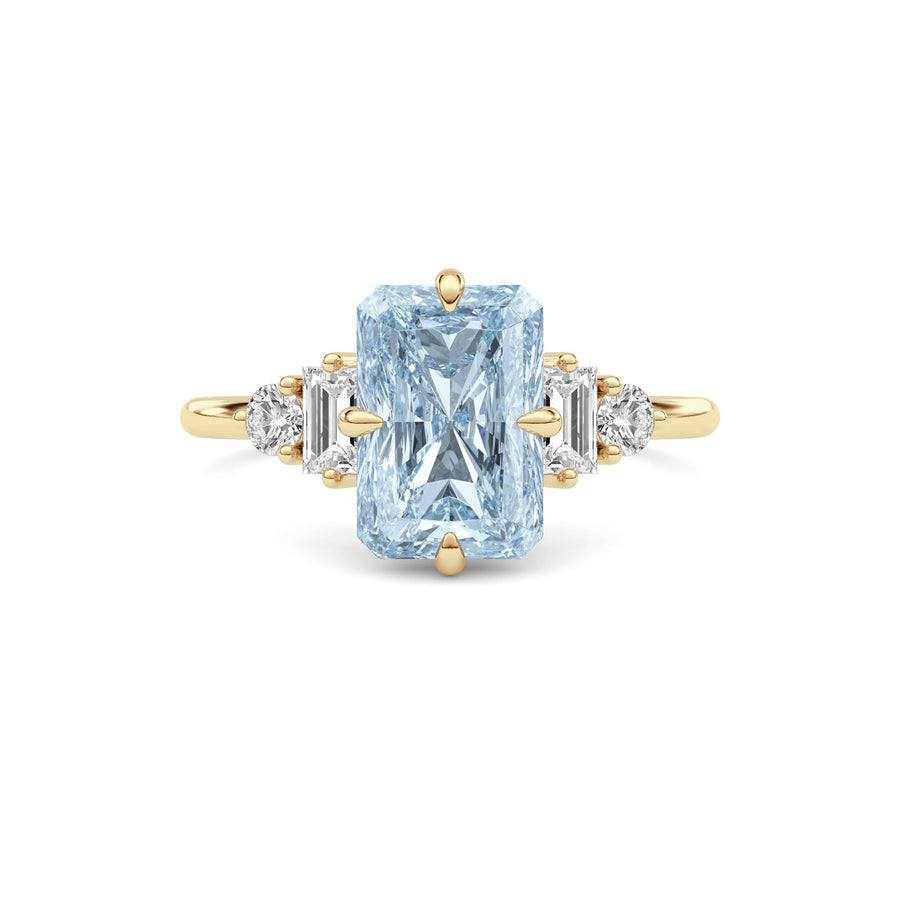 Yellow gold Three-Stone Fancy Blue Radiant Cut Diamond Ring with Heart Side Stones