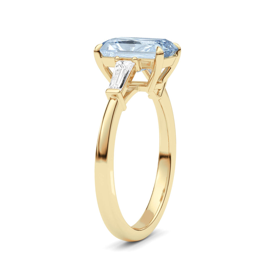 Yellow gold Three-Stone Fancy Blue Radiant Cut Diamond Ring with Tapered Baguette Side Stones