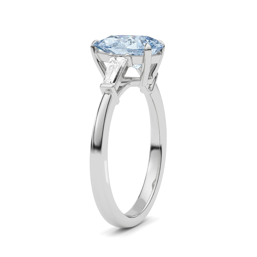 Platinum Three-Stone Fancy Blue Pear Cut Diamond Ring with Tapered Baguette Side Stones