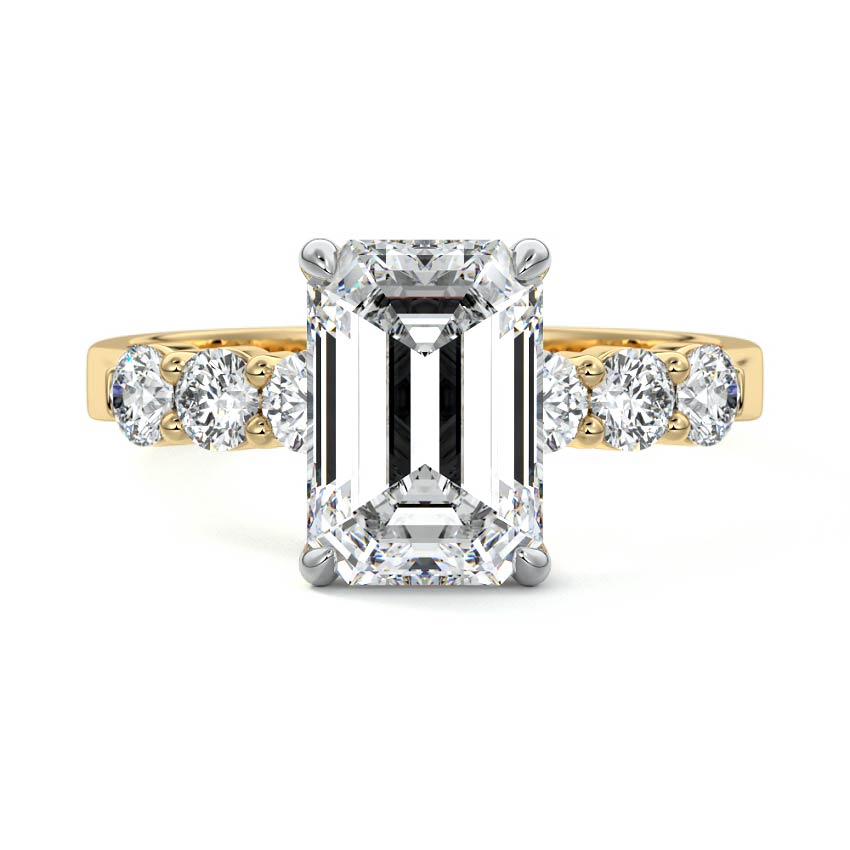Yellow gold Emerald Diamond Engagement Ring with Graduated Side Stones and Prong Setting