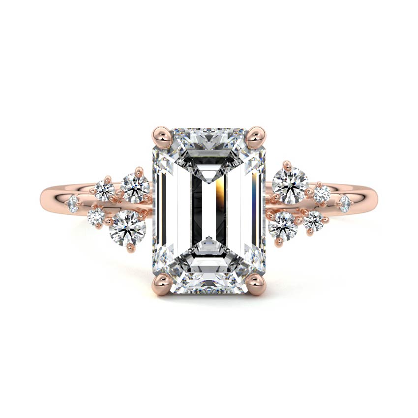 Rose gold Emerald Diamond Side Stone Engagement Ring with Clustered Round Accents