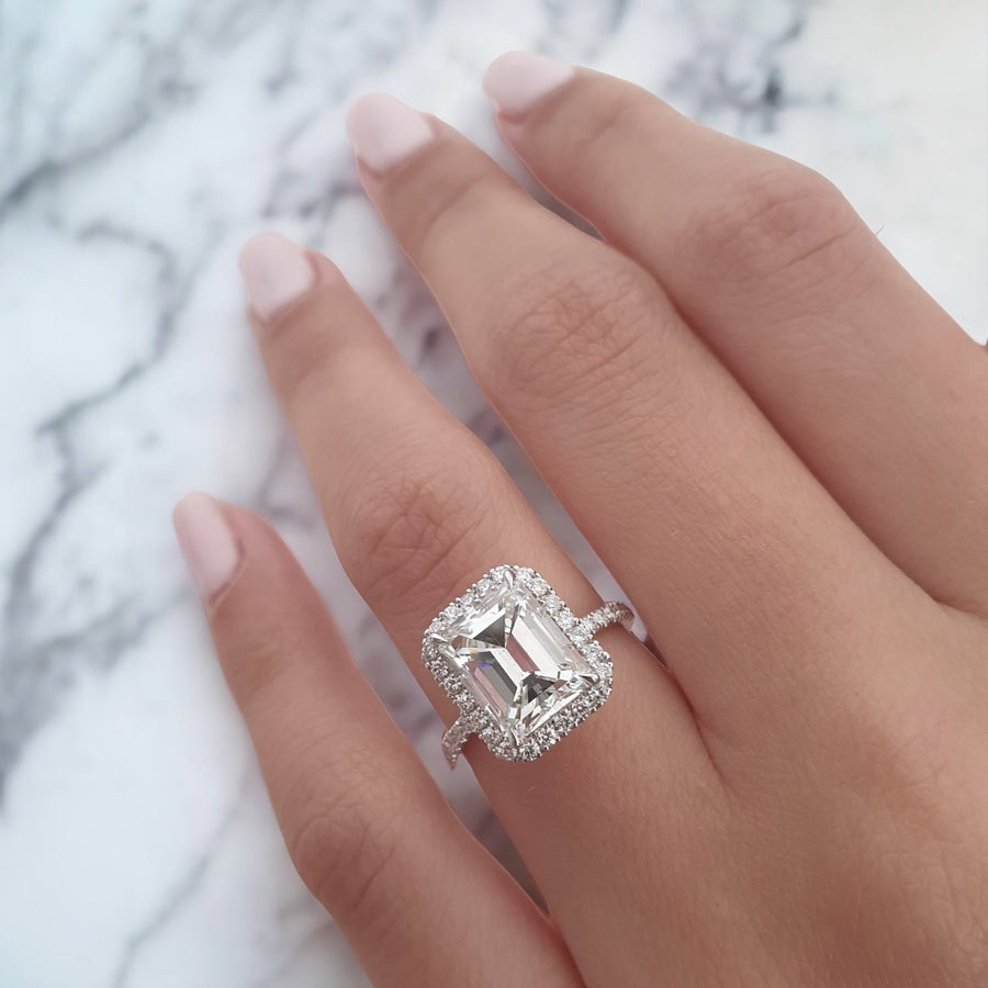 Silver Emerald Diamond Halo Engagement Ring with Round Accents