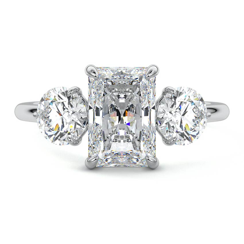 Platinum Three-Stone Radiant Diamond Ring with Round Side Stones