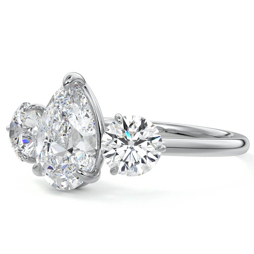 Platinum Three-Stone Pear Diamond Ring with Round Side Stones