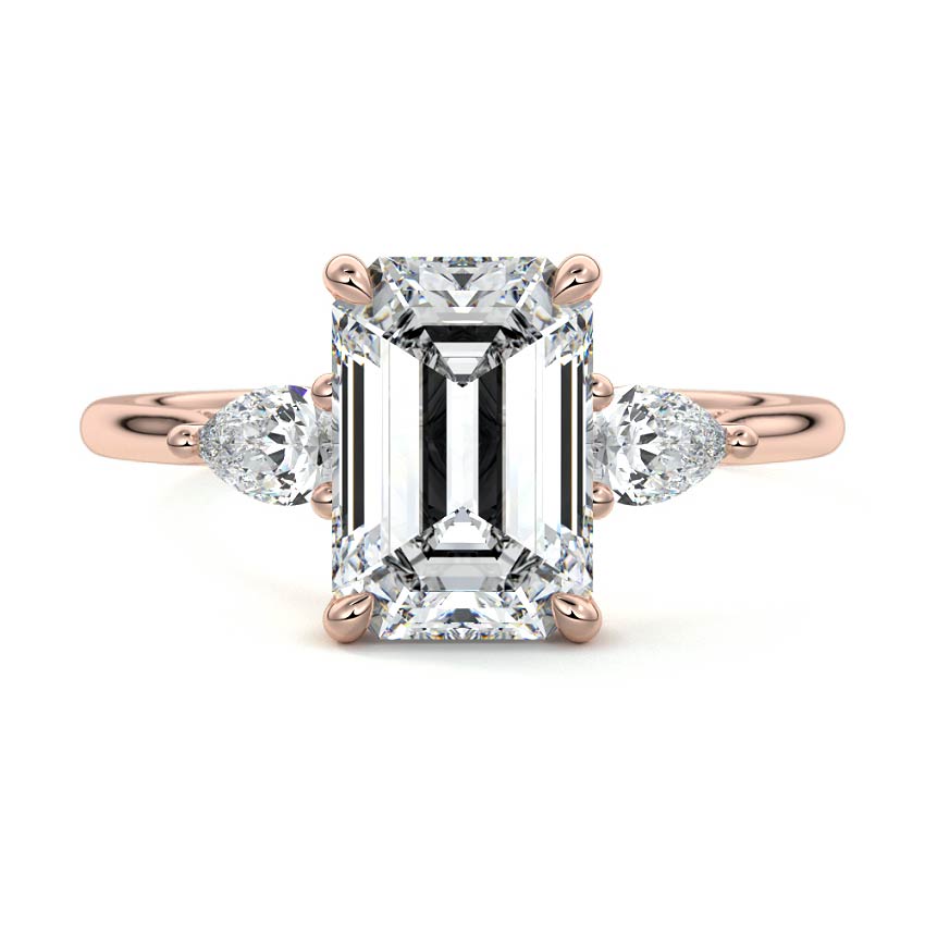 Rose gold Three-Stone Emerald Diamond Ring with Pear Side Stones