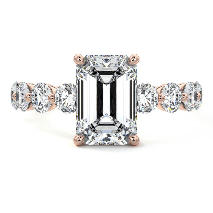 Rose gold Emerald Solitaire Diamond Engagement Ring with Graduated Round Side Stones