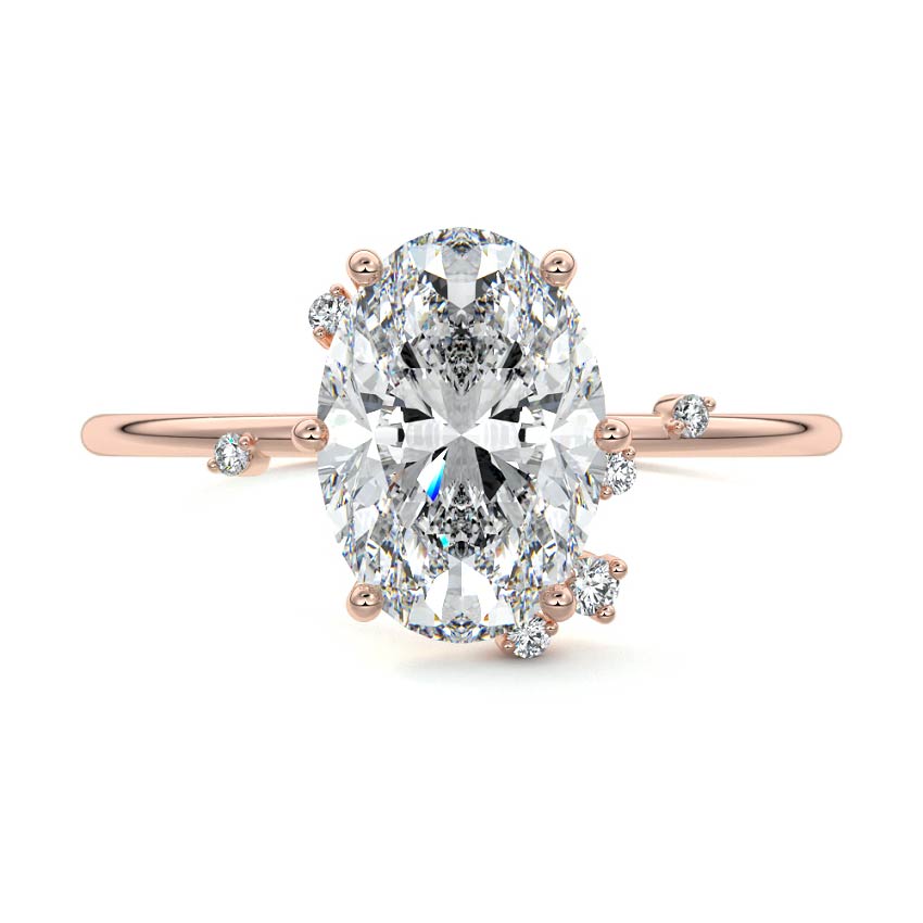 Rose gold Oval Diamond Side Stone Engagement Ring