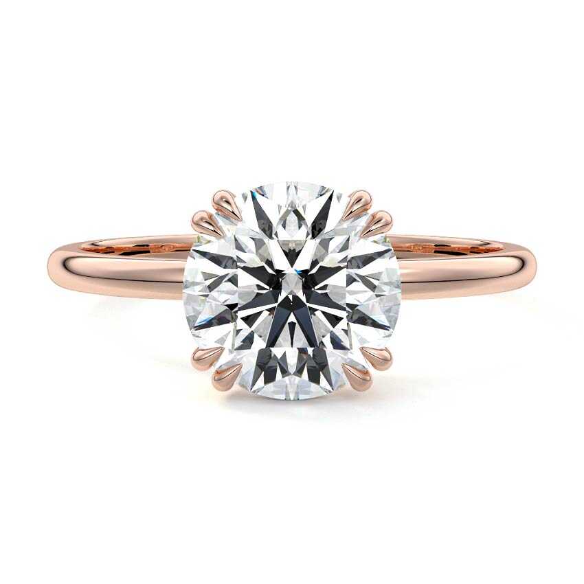 Rose gold Round Diamond Solitaire Engagement Ring with Classic Basket Setting
