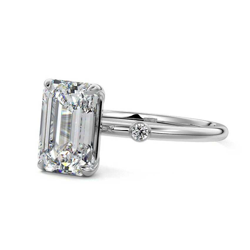 White gold Emerald Diamond Side Stone Ring with Round Accents