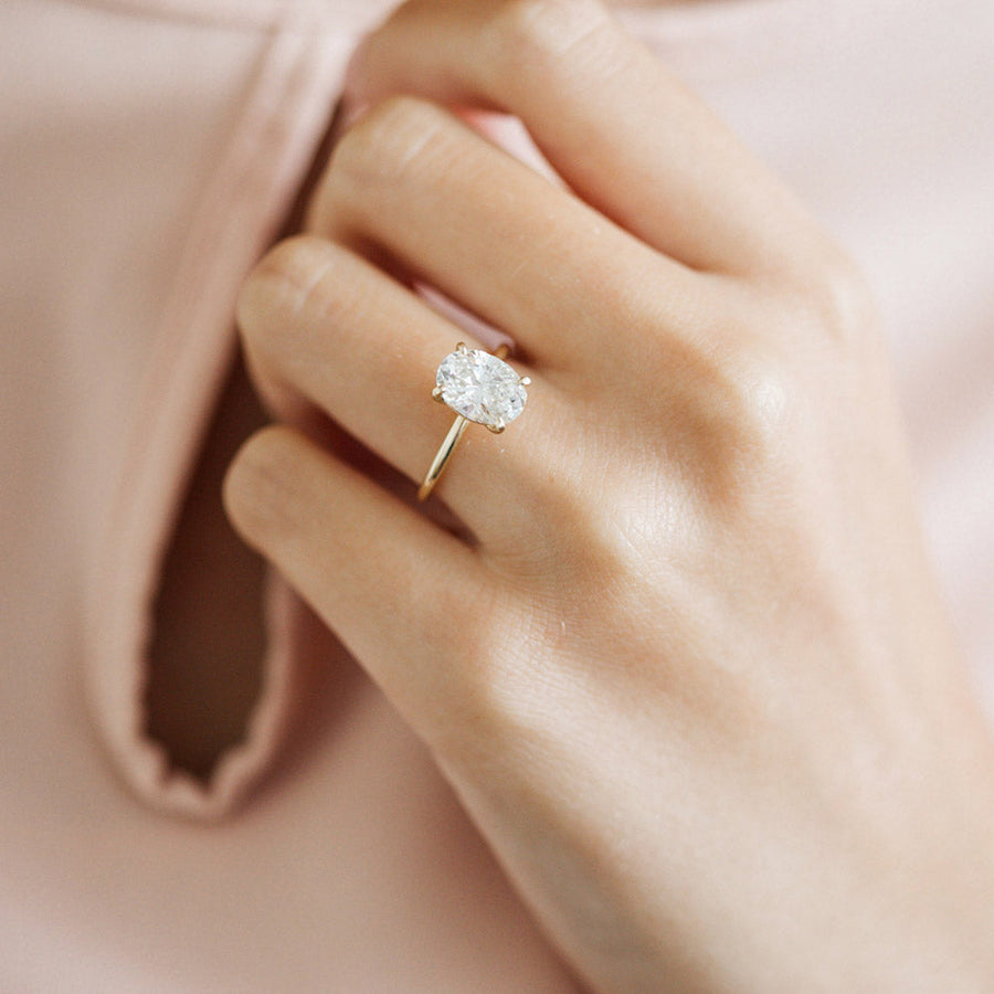 Yellow gold Oval Diamond Solitaire Engagement Ring with Hidden Halo