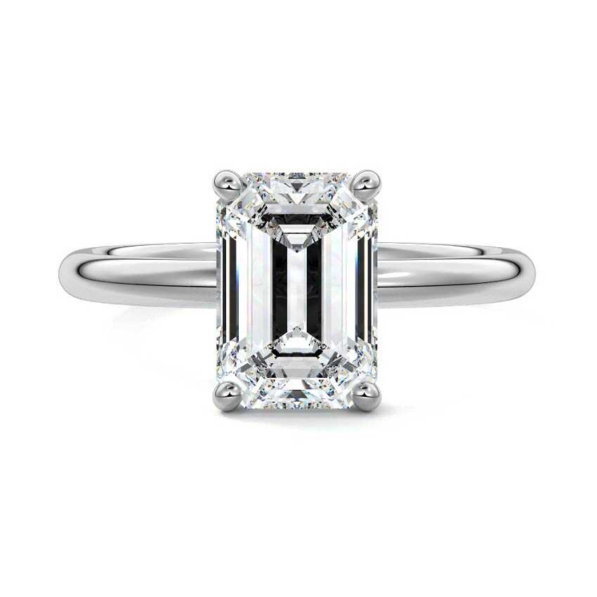 Silver Emerald Diamond Solitaire Engagement Ring with Low-Profile Basket Setting