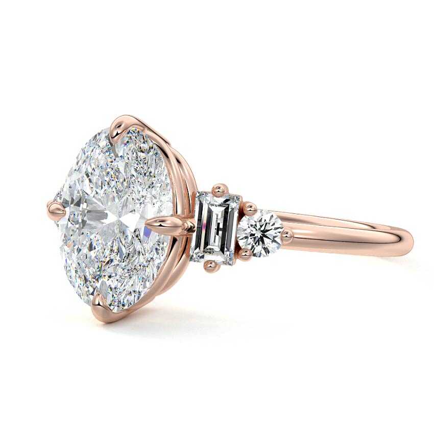 Rose gold Oval Three Stone Diamond Engagement Ring with Tapered Baguette and Round Side Stones