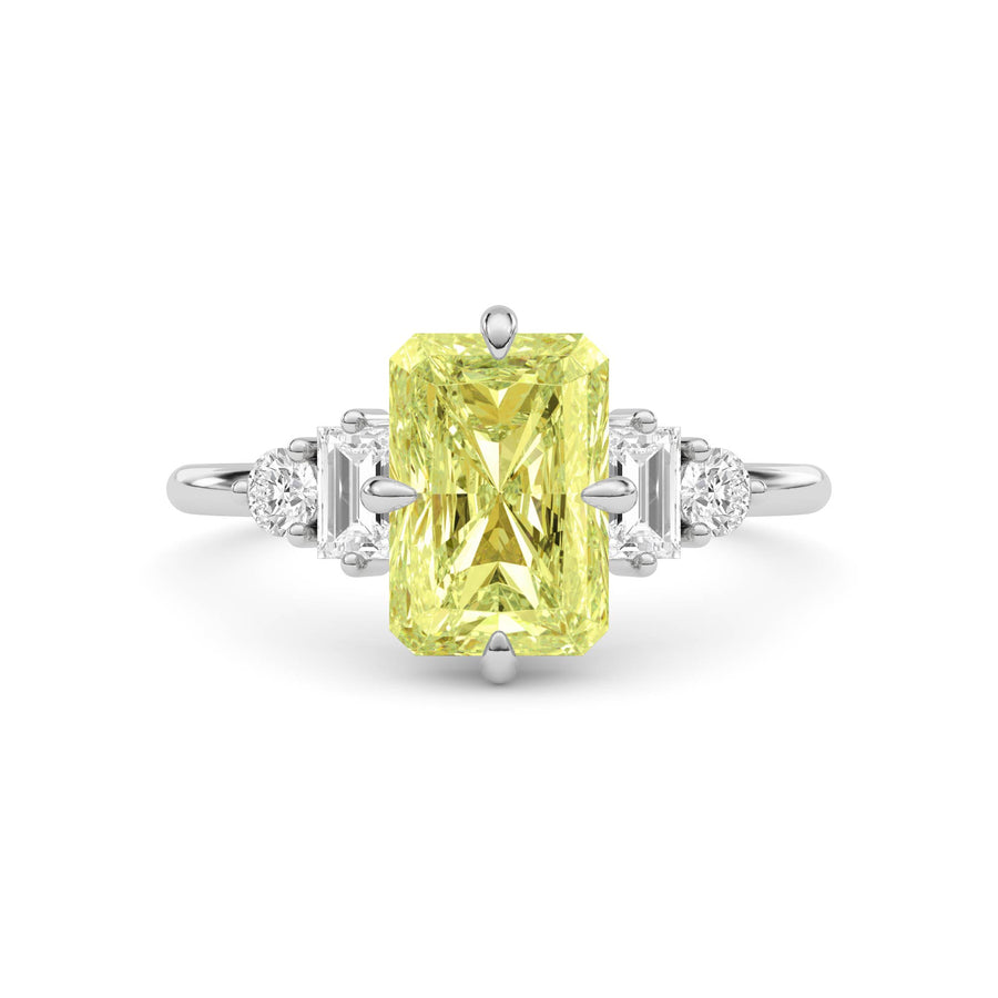 Yellow gold Fancy Yellow Radiant Cut Three Stone Diamond Engagement Ring with Tapered Baguette and Round Side Stones