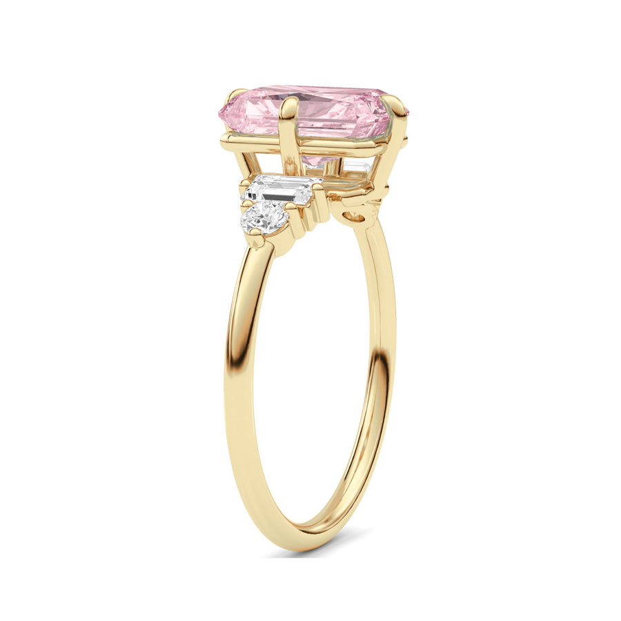 Yellow gold Fancy Pink Radiant Cut Three Stone Diamond Engagement Ring with Tapered Baguette and Round Side Stones