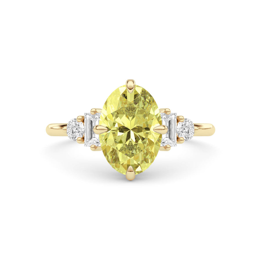 Yellow gold Fancy Yellow Oval Cut Three Stone Diamond Engagement Ring with Tapered Baguette and Round Side Stones