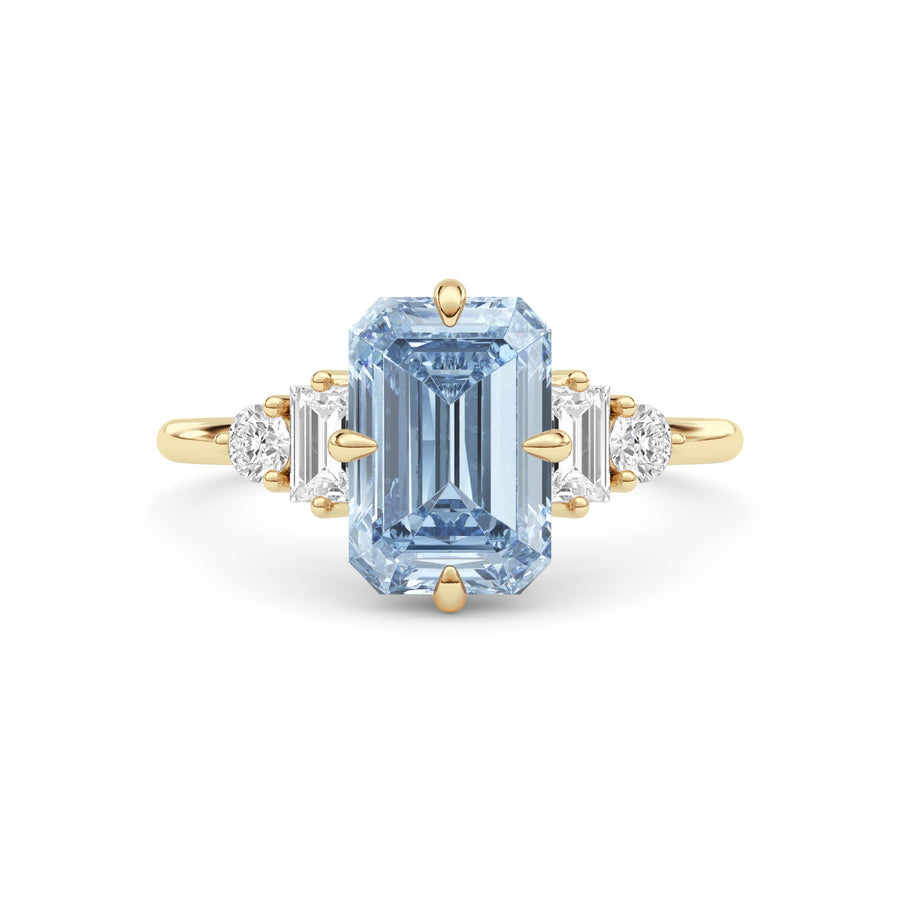 Yellow gold Fancy Blue Emerald Cut Three Stone Diamond Engagement Ring with Tapered Baguette and Round Side Stones