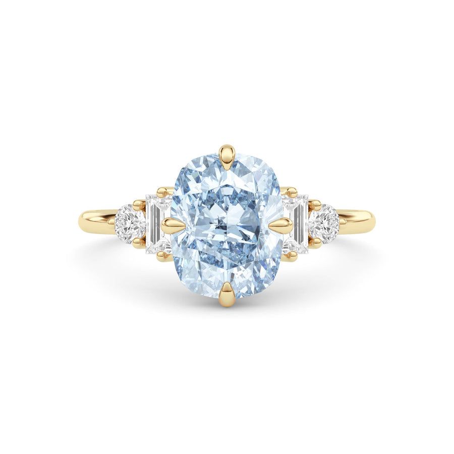 Yellow gold Fancy Blue Cushion Cut Three Stone Diamond Engagement Ring with Tapered Baguette and Round Side Stones