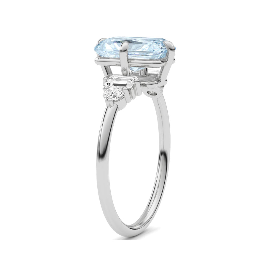 White gold Fancy Blue Radiant Cut Three Stone Diamond Engagement Ring with Tapered Baguette and Round Side Stones
