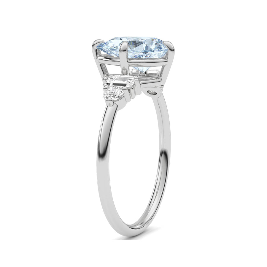 White gold Fancy Blue Pear Cut Three Stone Diamond Engagement Ring with Tapered Baguette and Round Side Stones