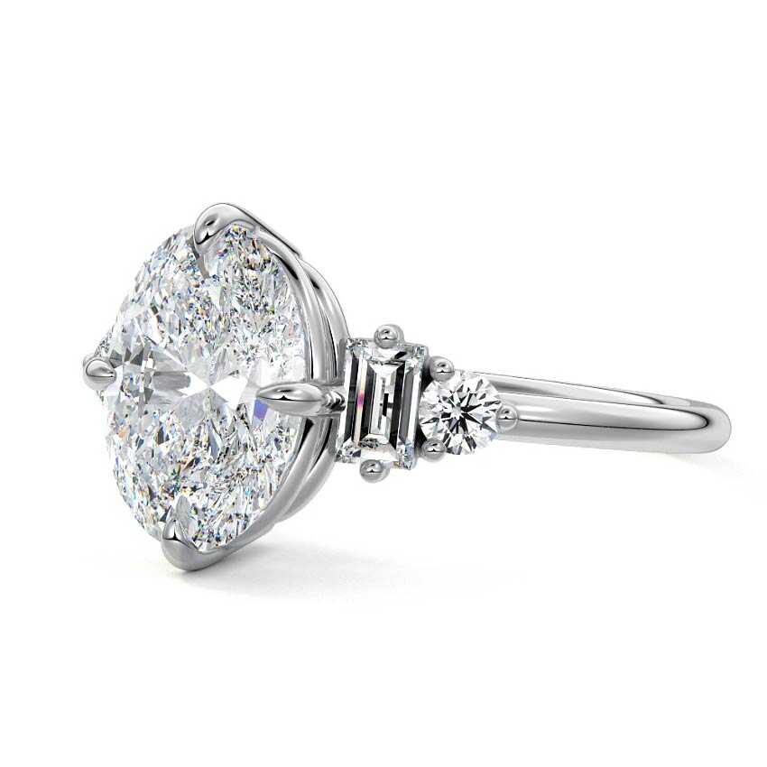 Silver Oval Three Stone Diamond Engagement Ring with Tapered Baguette and Round Side Stones