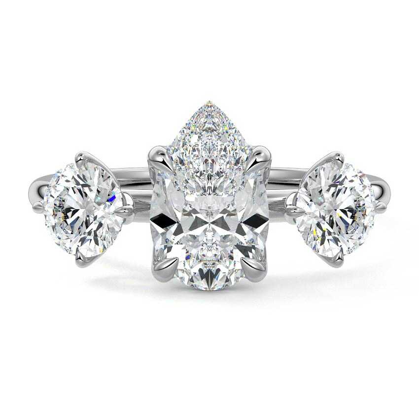 White gold Pear Diamond Three-Stone Ring with Round Side Stones