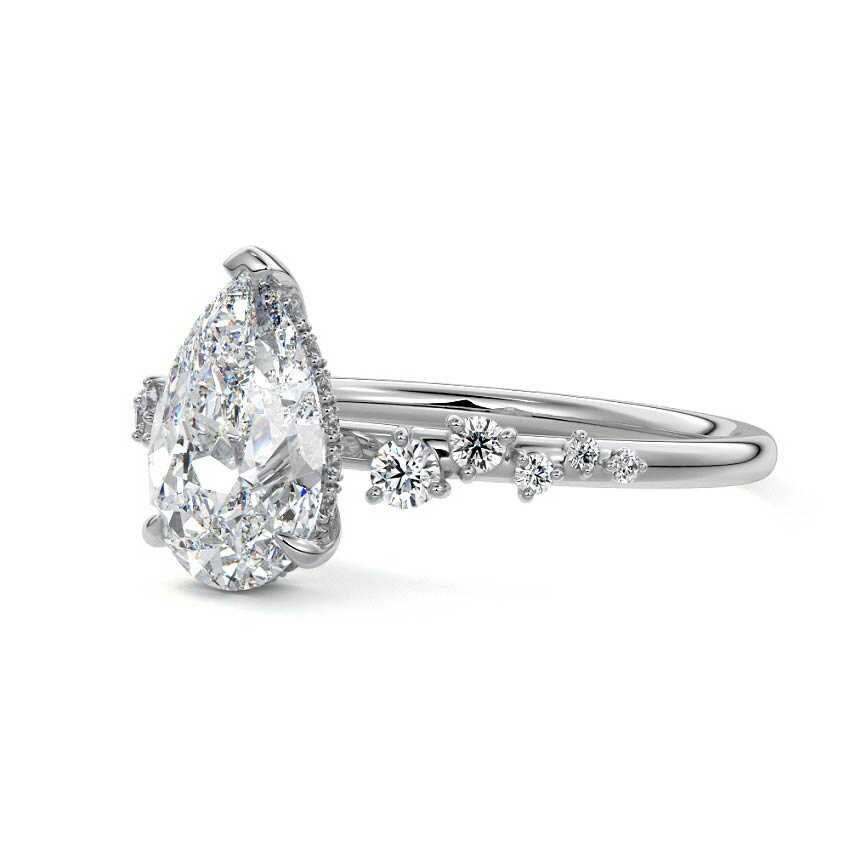 Silver Pear Diamond Side Stone Engagement Ring with Hidden Halo and Cluster Accents