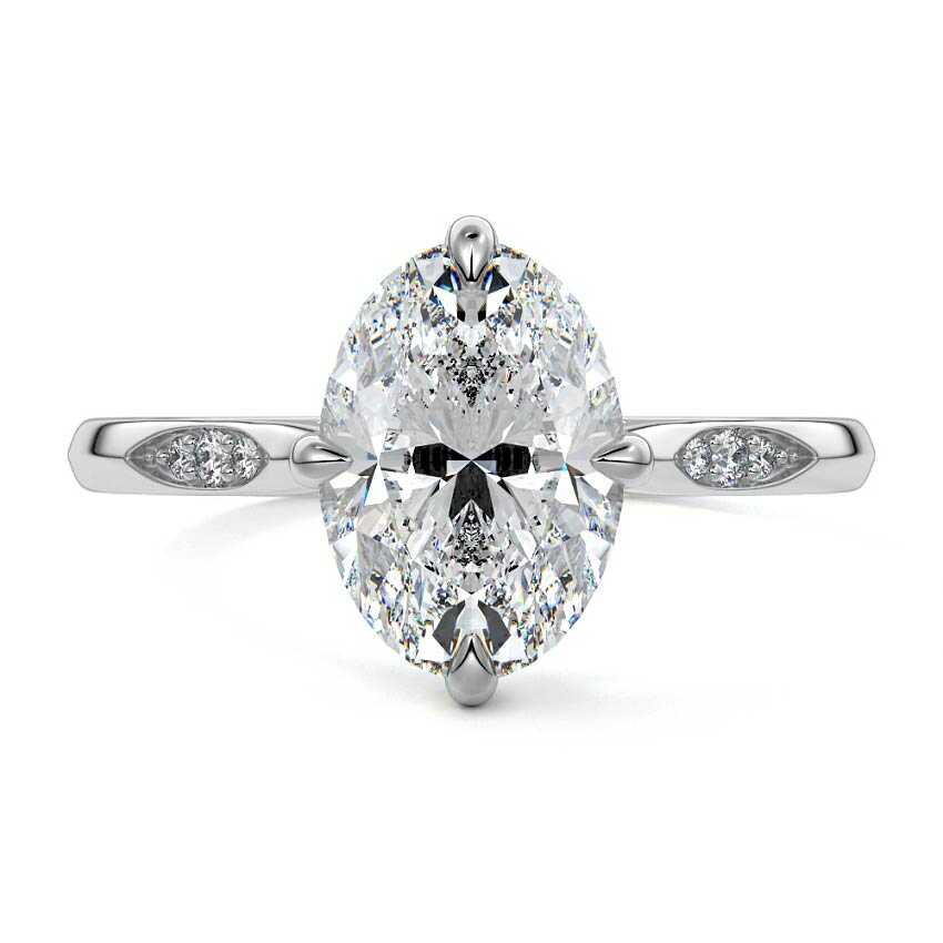 White gold Oval Diamond Side Stone Ring with Flush Set Round Accents in Prong Setting