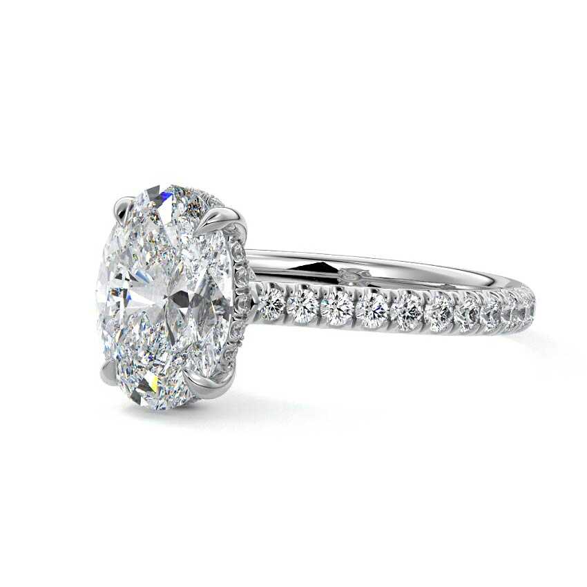 White gold Oval Diamond Hidden Halo Engagement Ring with Pavé Band