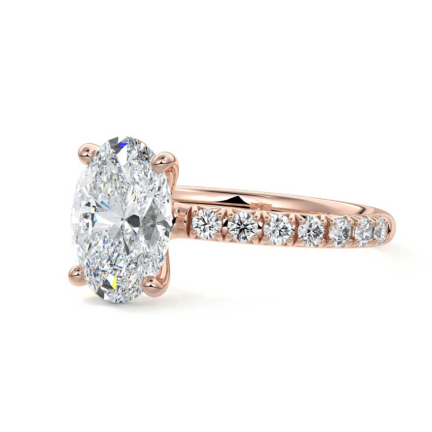 Rose gold Oval Diamond Solitaire Engagement Ring with Pavé Band and Prong Setting