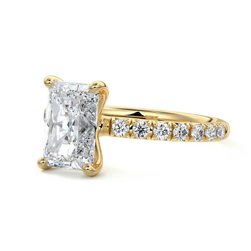 Yellow gold Radiant Diamond Solitaire Engagement Ring with Pavé Band and Prong Setting