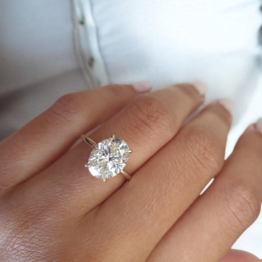 Yellow gold Oval Diamond Solitaire Engagement Ring with Hidden Halo