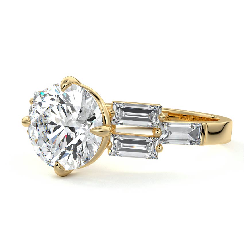 Yellow gold Round Diamond Three-Stone Ring with Tapered Baguette Side Stones in Prong Setting