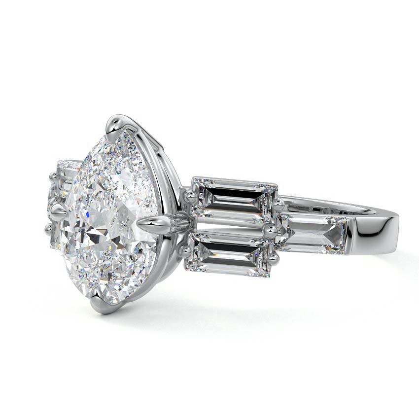 White gold Pear Diamond Three-Stone Ring with Tapered Baguette Side Stones in Prong Setting