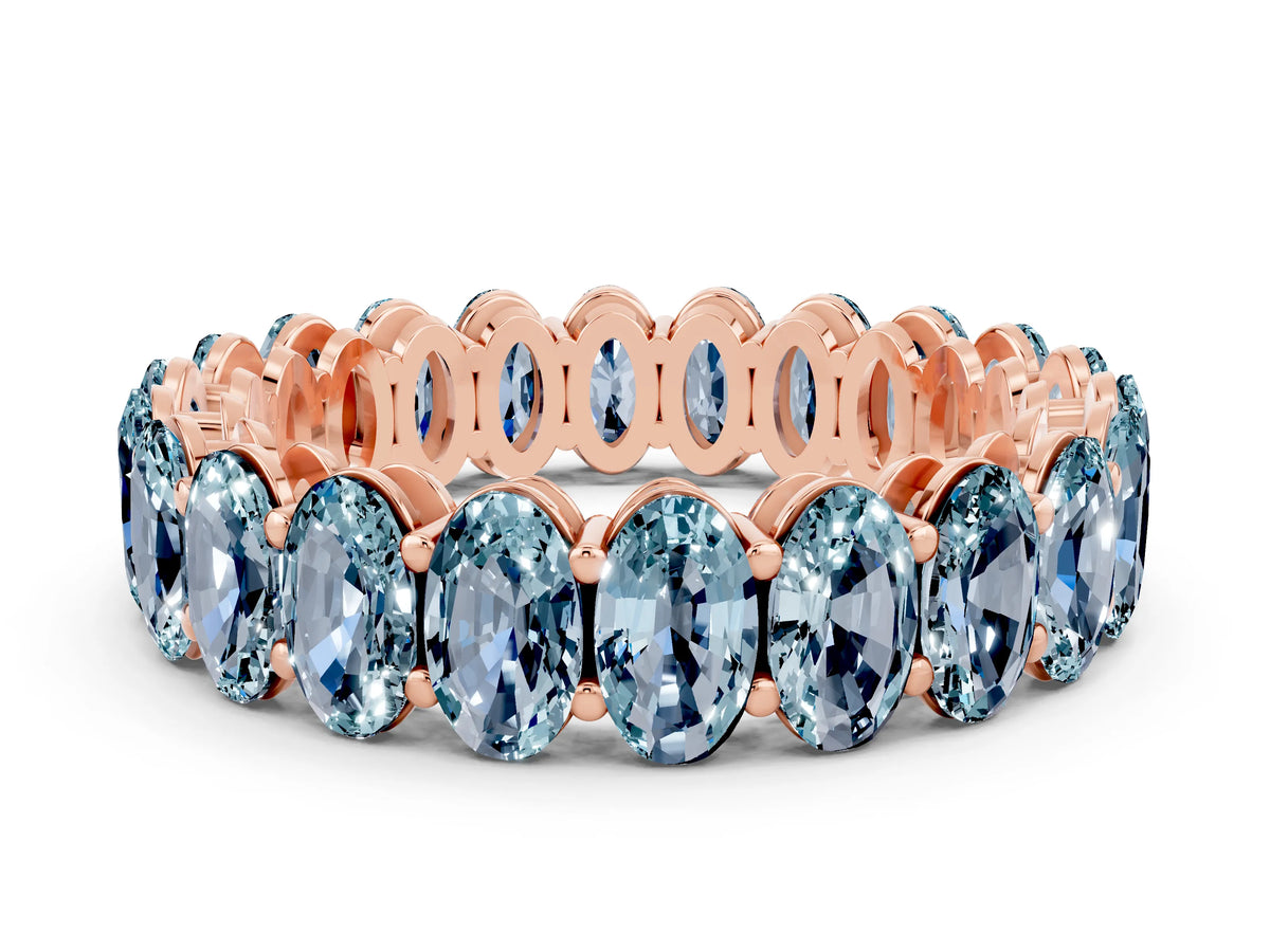 Oval Cut Aquamarine Eternity Band in Rose gold with Shared Prong Setting