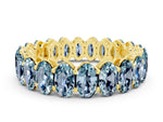 Oval Cut Aquamarine Eternity Band in Yellow gold with Shared Prong Setting