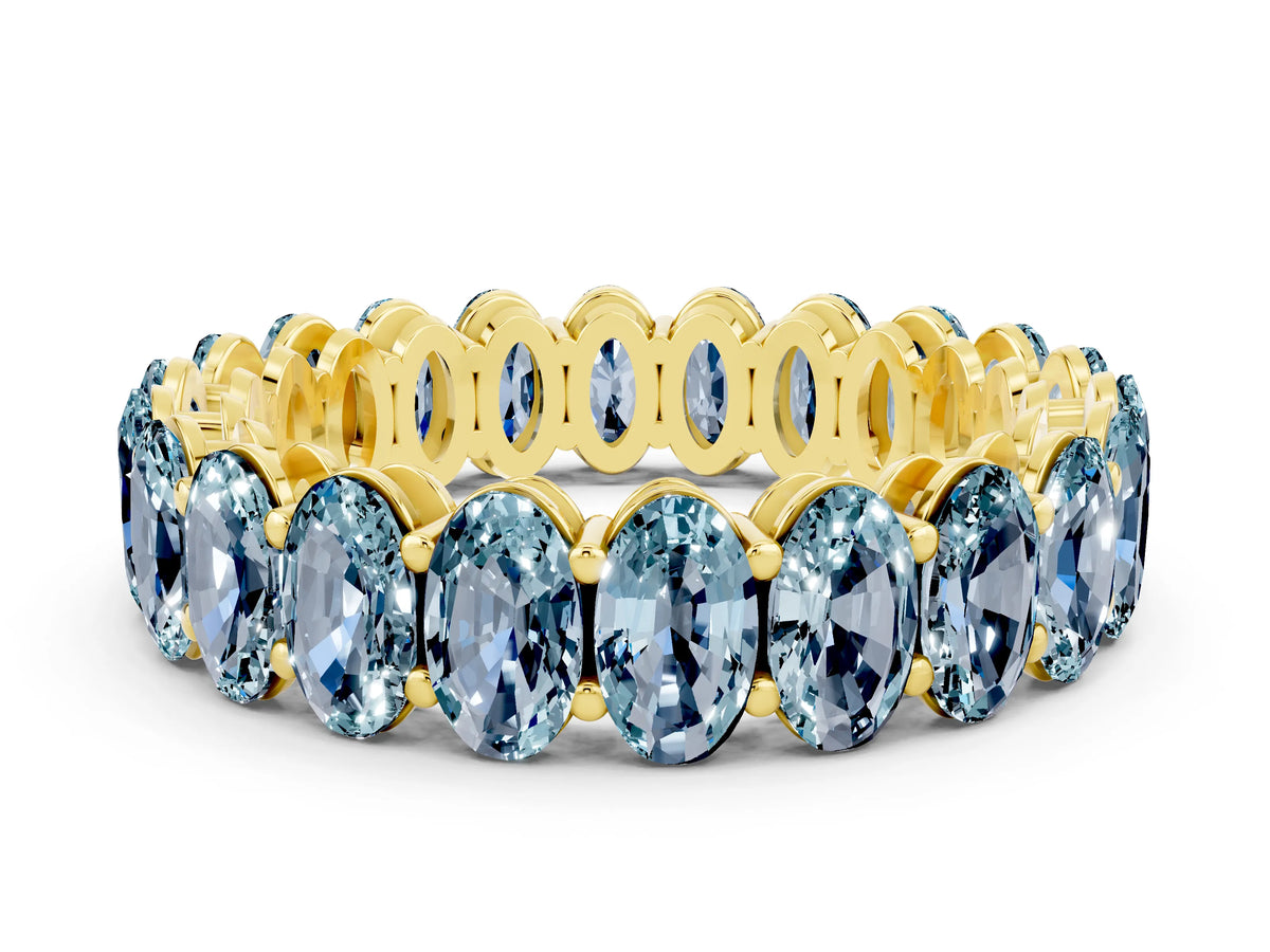 Oval Cut Aquamarine Eternity Band in Yellow gold with Shared Prong Setting