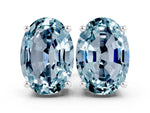 Oval Cut Aquamarine Stud Earrings in White gold with Basket Setting