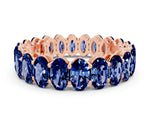 Oval Cut Blue Sapphire Eternity Band in Rose gold with Shared Prong Setting