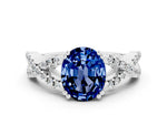 Oval Cut Blue Sapphire Solitaire Ring in Platinum with Interwoven Pavé Band and Prong Setting_6