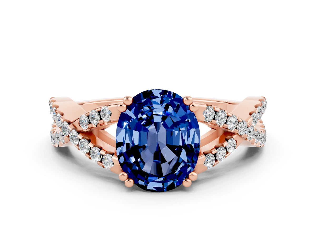 Oval Cut Blue Sapphire Solitaire Ring in Rose gold with Interwoven Pavé Band and Prong Setting