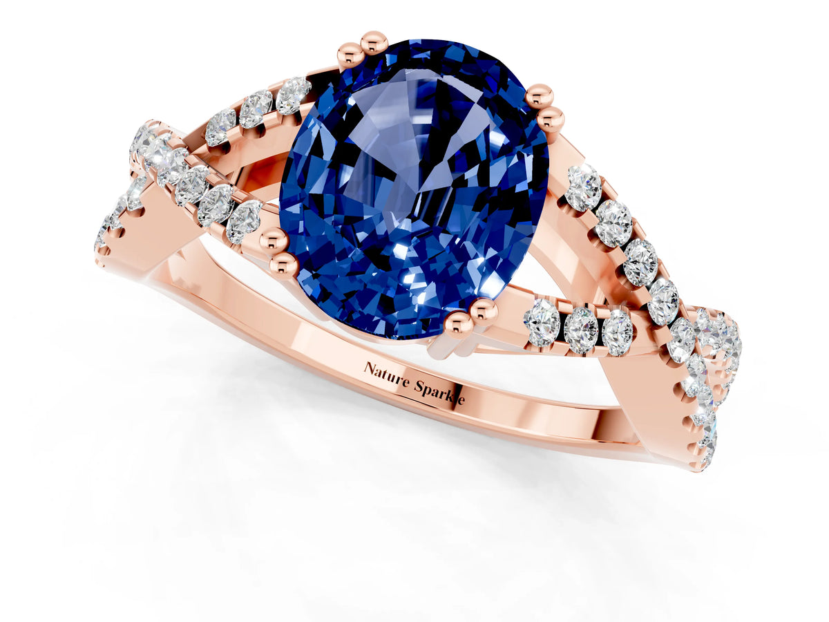 Oval Cut Blue Sapphire Solitaire Ring in Rose gold with Interwoven Pavé Band and Prong Setting_1