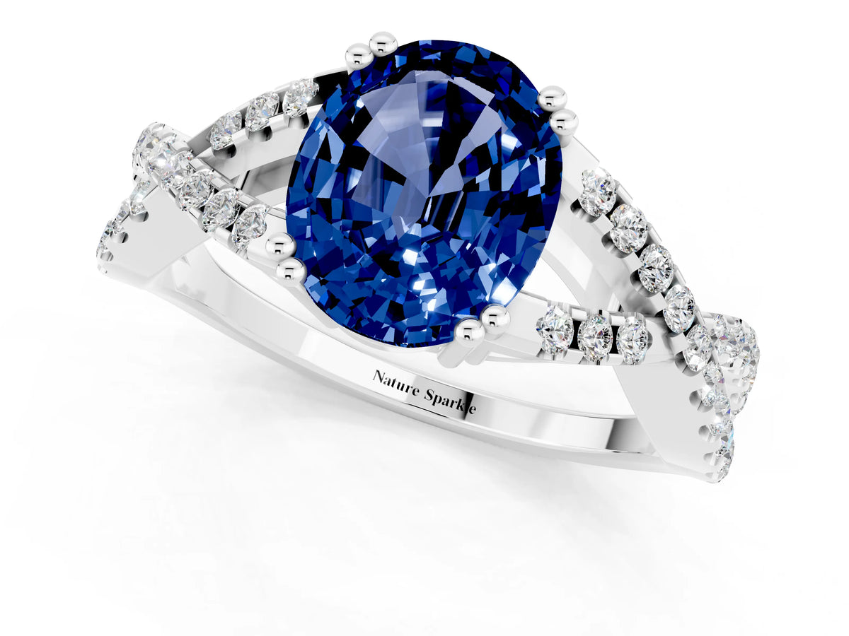 Oval Cut Blue Sapphire Solitaire Ring in White gold with Interwoven Pavé Band and Prong Setting_1