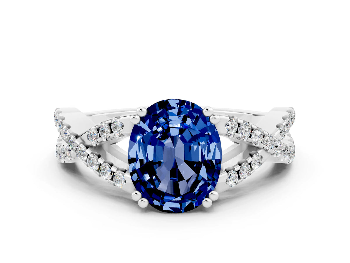 Oval Cut Blue Sapphire Solitaire Ring in White gold with Interwoven Pavé Band and Prong Setting