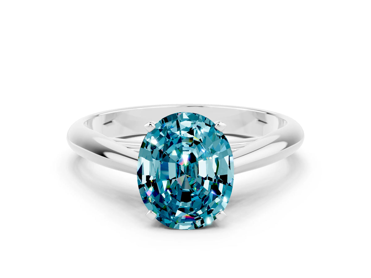 Oval Cut Blue Topaz Cathedral Solitaire Engagement Ring in White gold with Prong Setting