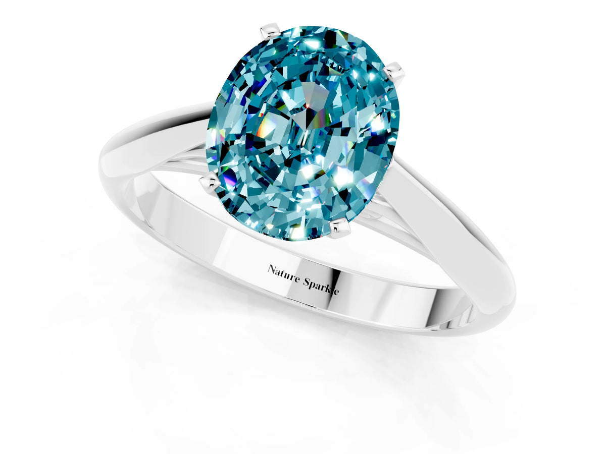 Oval Cut Blue Topaz Cathedral Solitaire Engagement Ring in White gold with Prong Setting_1